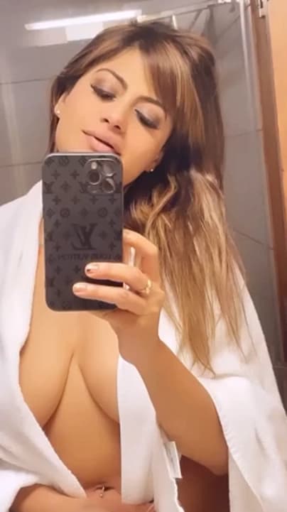 Check out Suhaani Laskar nude stripping and revealing her big boobs and shaved pussy - Video 4